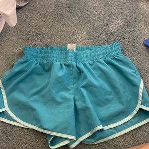 Blue athletic shorts. Size: M